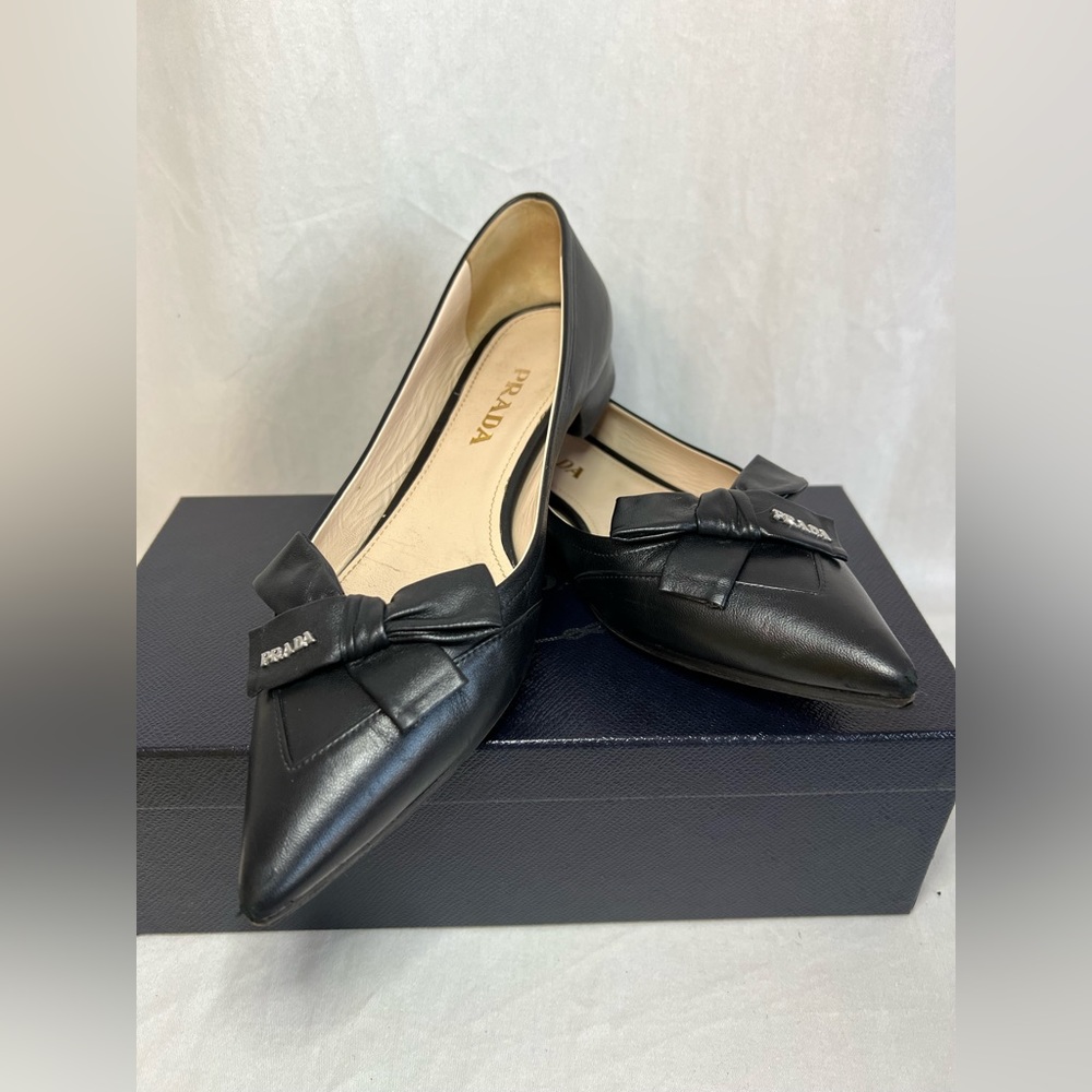 Prada shoes.calzature donna black bows on the top.